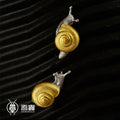 Gold-plated silver snail stud earrings, one pair